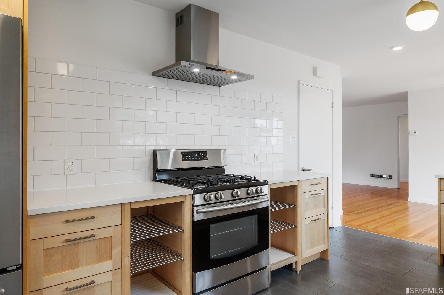 3101 Sunset Terrace San Mateo, CA 94403 - Photo 9 of 24 a kitchen with cabinets and appliances