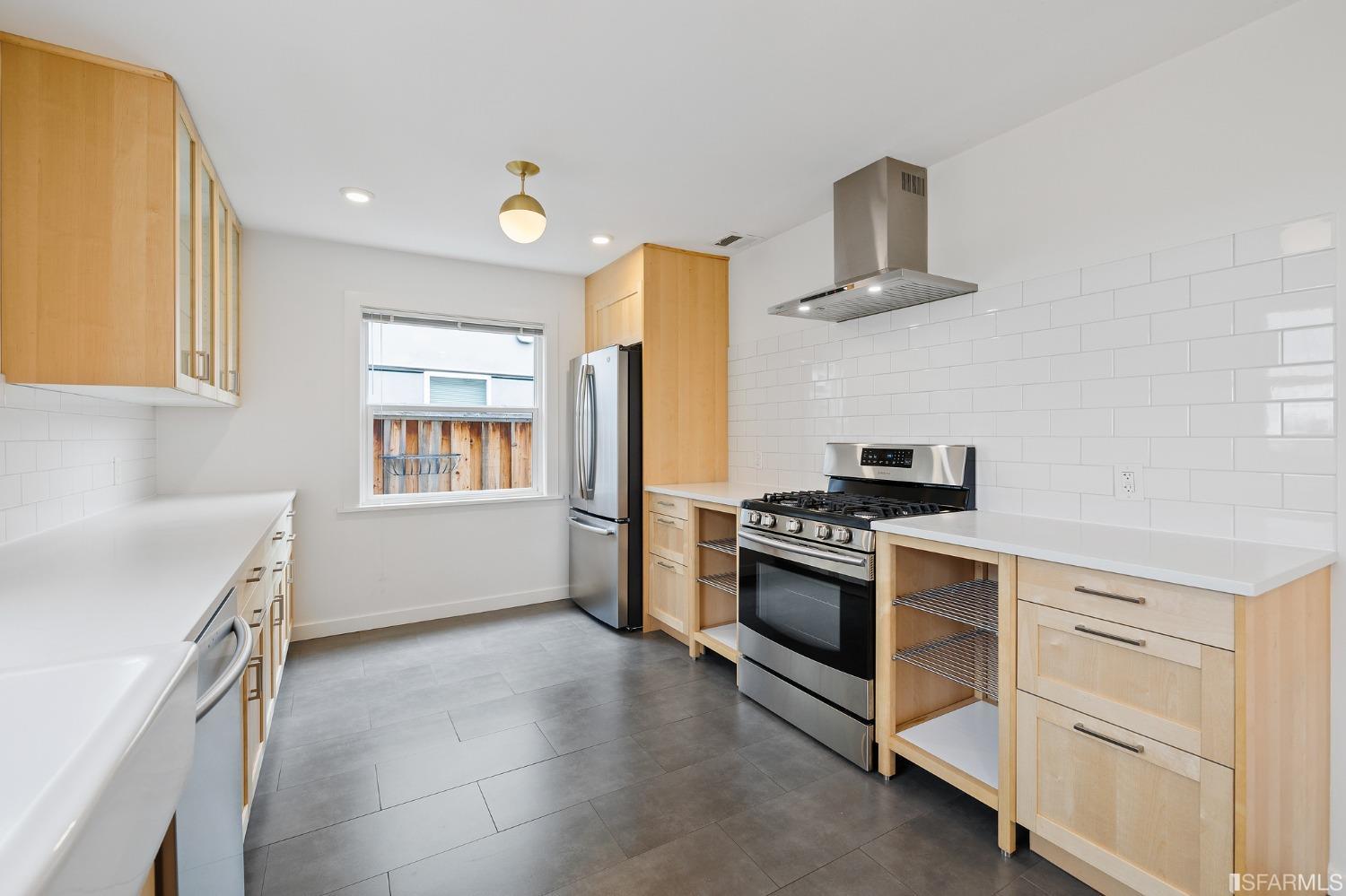 3101 Sunset Terrace San Mateo, CA 94403 - Photo 10 of 24 a kitchen with a stove and a refrigerator