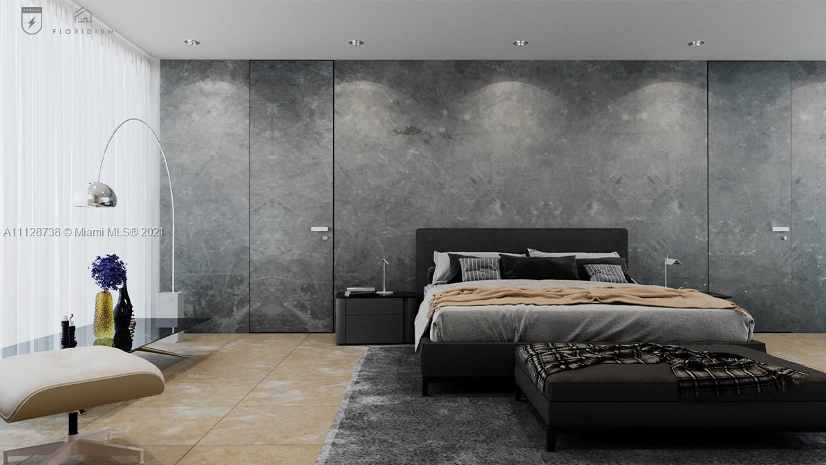 5850 Alton Road Miami Beach, FL 33140 - Photo 15 of 27 a bedroom with a bed and a mirror