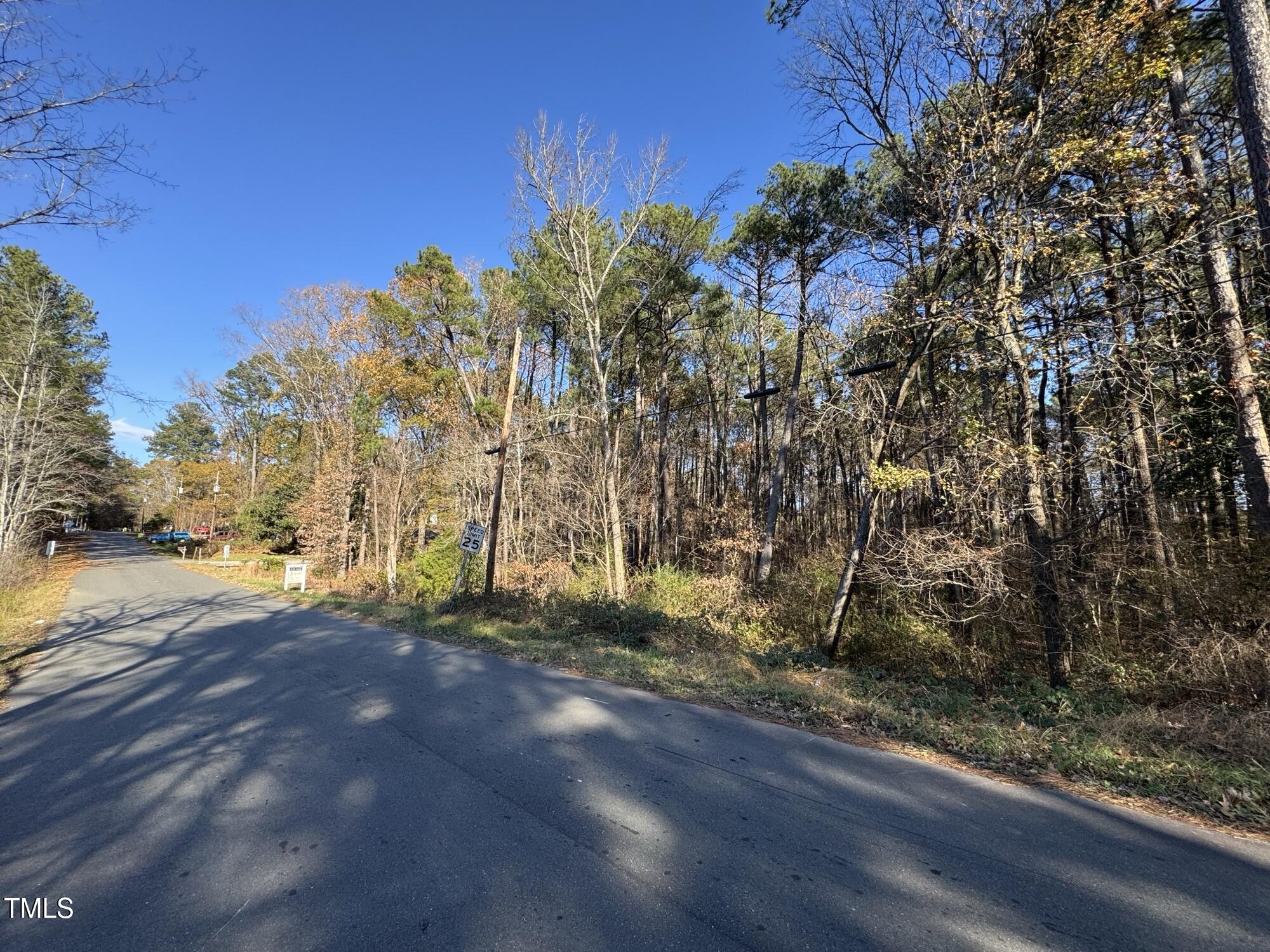 3024-3026 Ruth Street Durham, NC 27704 - Photo 3 of 11 a view of a yard with a tree