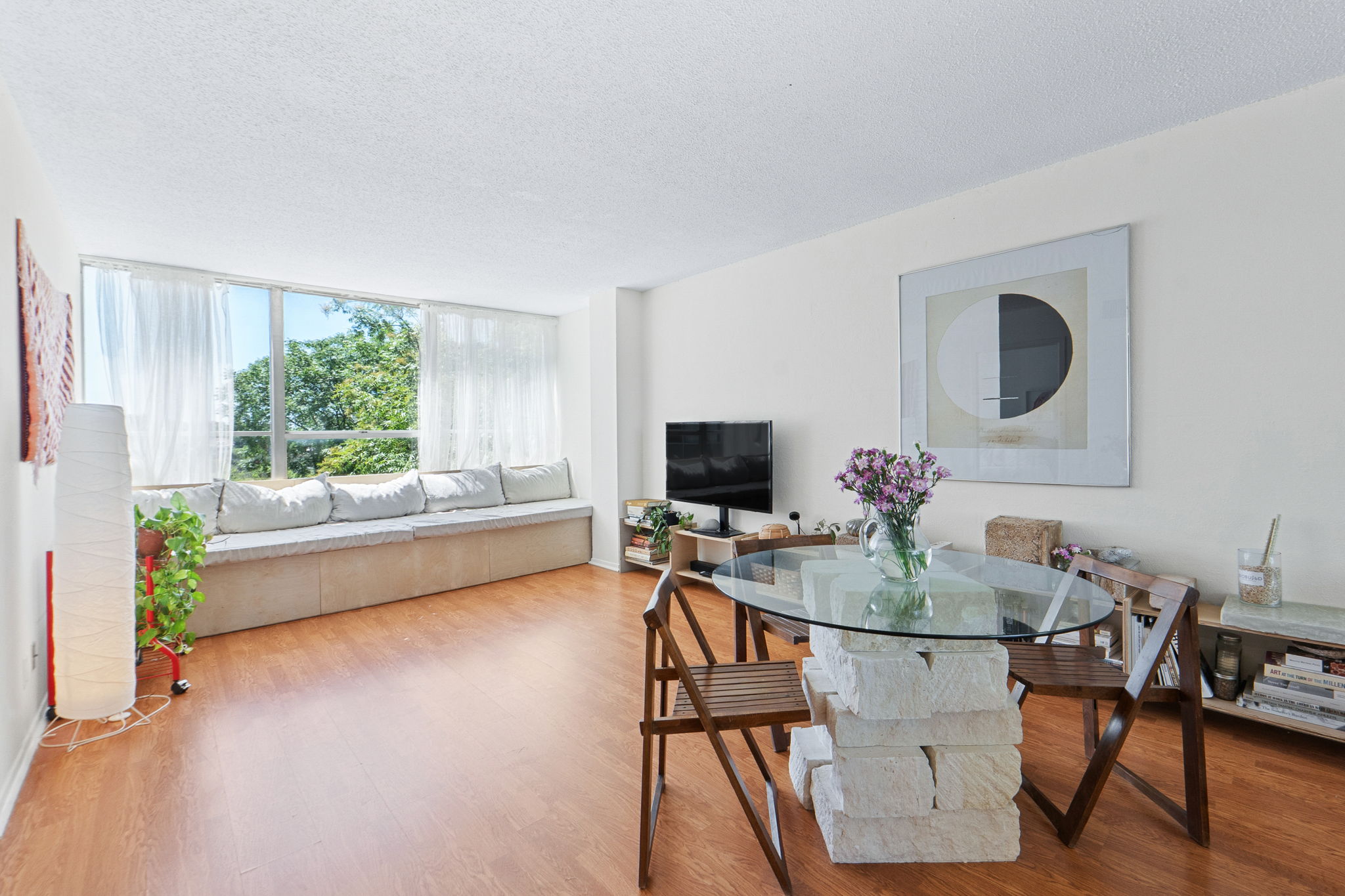 1800 Lavaca Street, Unit 413 Austin, TX 78701 - Photo 1 of 17 Dining room with a textured ceiling and wood finished floors