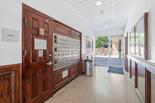 a view of a porch with chairs and couches