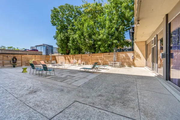a view of a terrace with chairs
