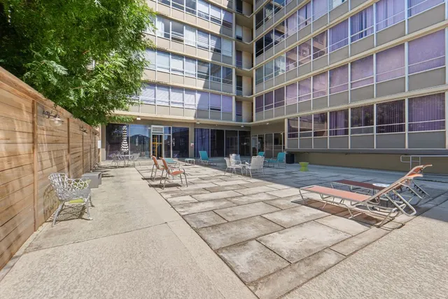 a view of a building with a patio