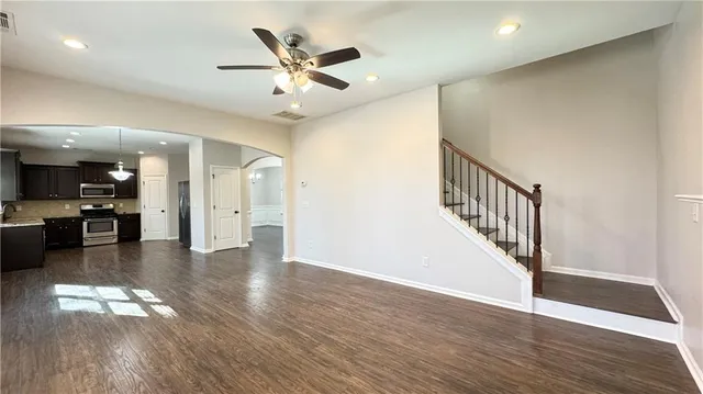 a bathroom with a sink a mirror and a bathtub