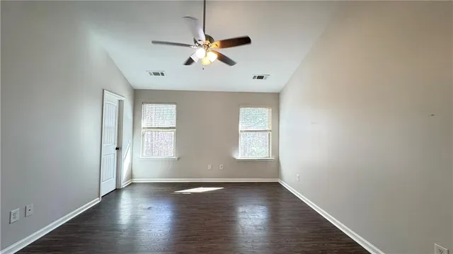 a view of a small space with racks on the wall