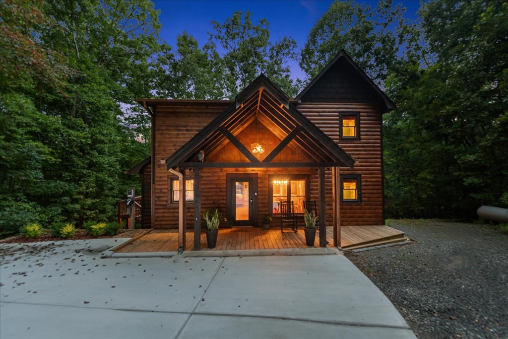 126 Brookwood Drive Blue Ridge, GA 30513 - Photo 2 of 84 a view of a house with a yard