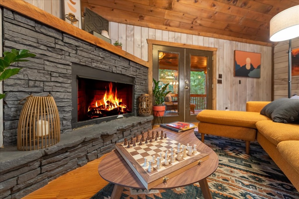 126 Brookwood Drive Blue Ridge, GA 30513 - Photo 42 of 84 a outdoor living space with patio furniture and a fireplace