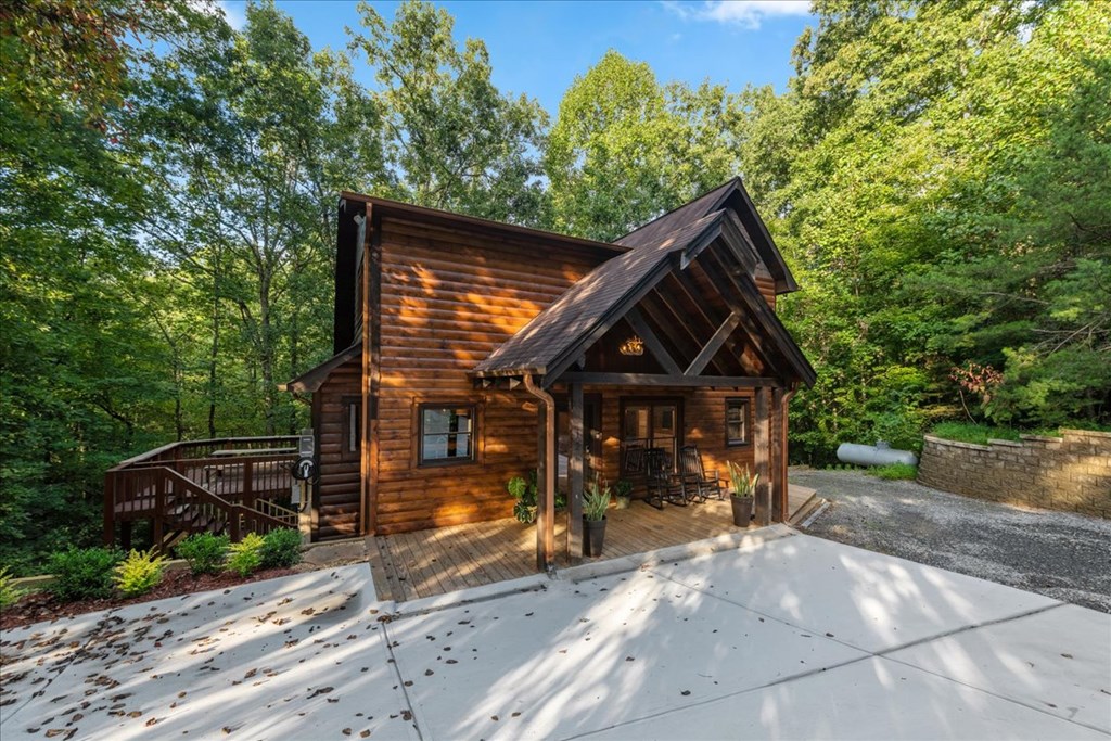 126 Brookwood Drive Blue Ridge, GA 30513 - Photo 5 of 84 a view of a house with a yard