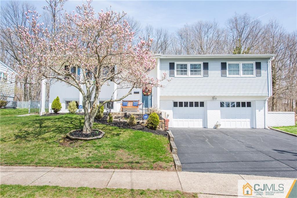 4 Peake Road Edison, NJ 08837 - Photo 1 of 25 a view of a house with a yard