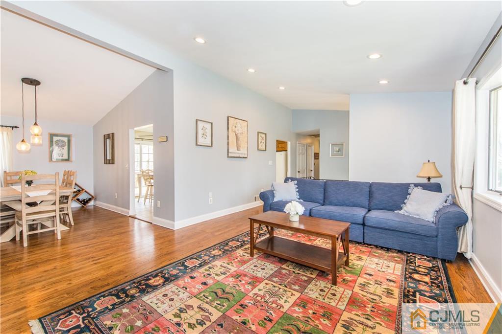 4 Peake Road Edison, NJ 08837 - Photo 5 of 25 a living room with furniture and a rug