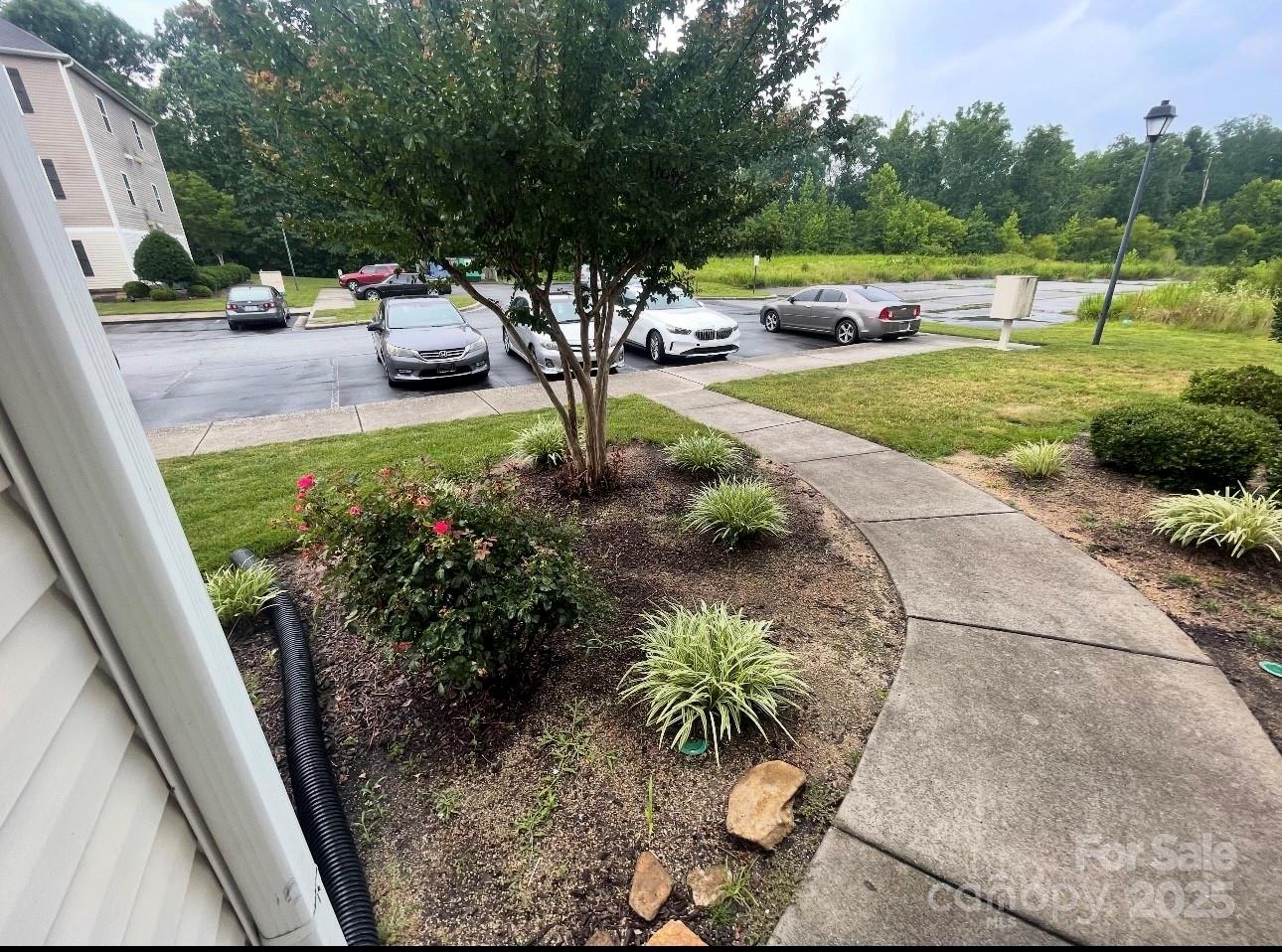 5430 Forester Drive High Point, NC 27265 - Photo 2 of 21 a view of a garden with cars parked