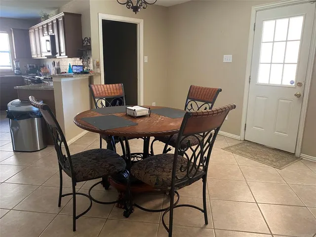 an empty room with wooden floor