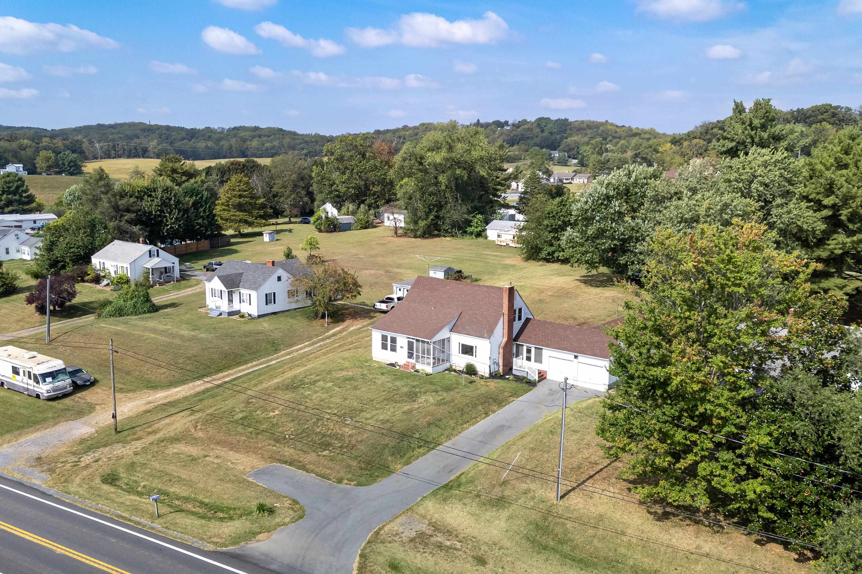 3138 Cross Keys Road Harrisonburg, VA 22801 - Photo 65 of 74 The aerial view highlights the overhead view of the spacious lot, farmland nearby the home, mountains offering beautiful views, and much more!