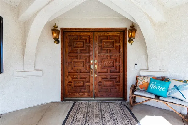 a kitchen with stainless steel appliances granite countertop wooden cabinets a stove top oven a sink and dishwasher