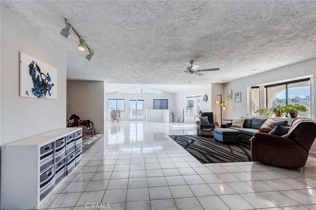 a bedroom with a bed and a mirror