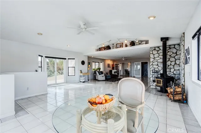 a bathroom with a tub and mirror