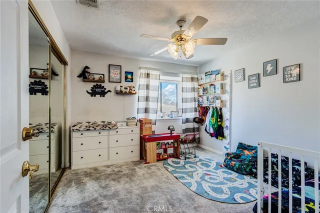 a room with gym equipment and a large window
