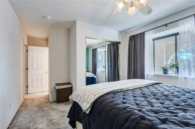 a view of a patio with chairs and tables