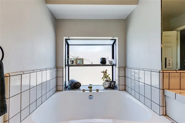 a view of a car parked in front of a house