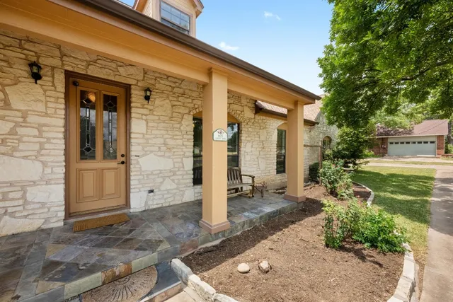 a view of a porch with seating space