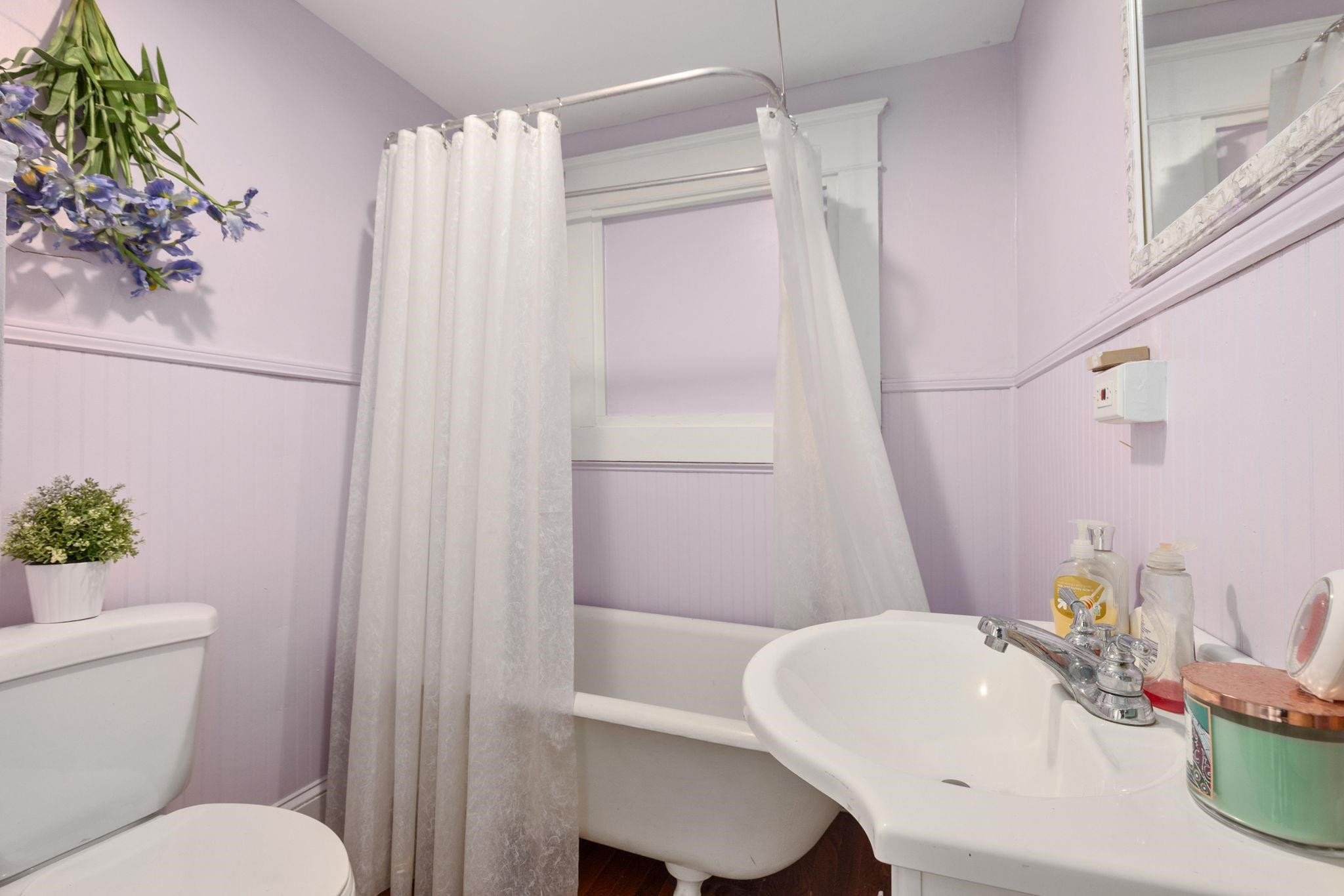 330 Pershing Road Raleigh, NC 27608 - Photo 22 of 51 The 2nd full bath on the first floor is complete with a claw foot tub. Full Bath on 1st Floor