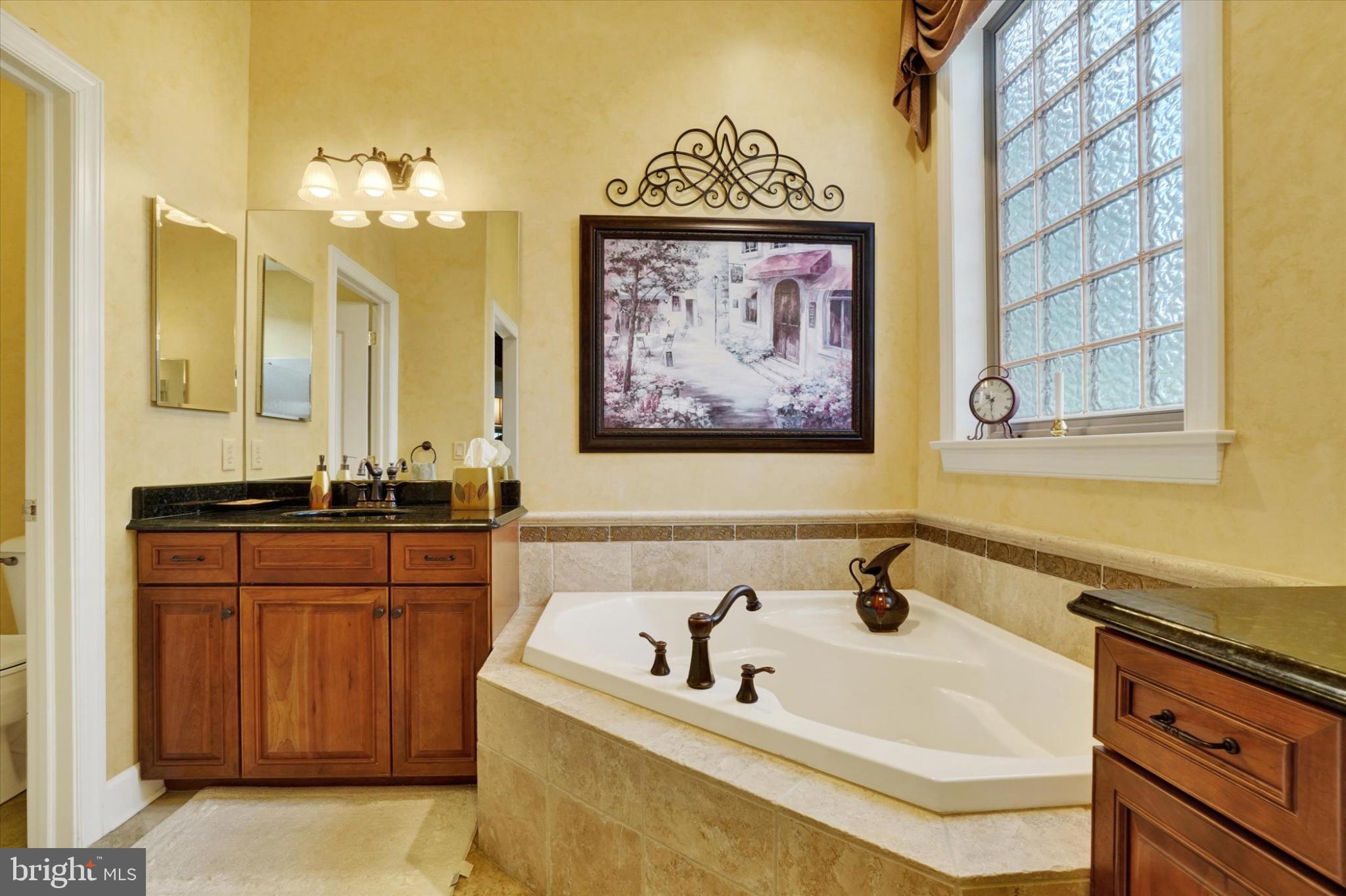 10 Azalea Drive Windsor, PA 17366 - Photo 23 of 36 Elegant bathroom with luxurious tub and art.