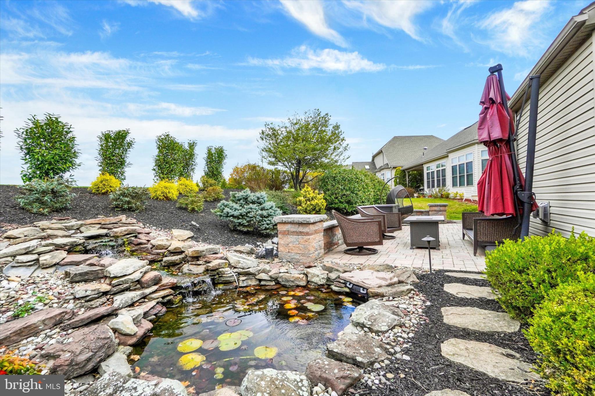 10 Azalea Drive Windsor, PA 17366 - Photo 32 of 36 Tranquil garden oasis with serene pond.