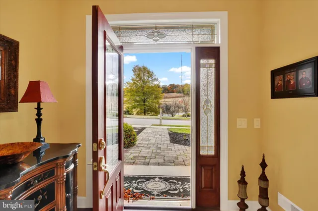 a view of a entryway door front of a house