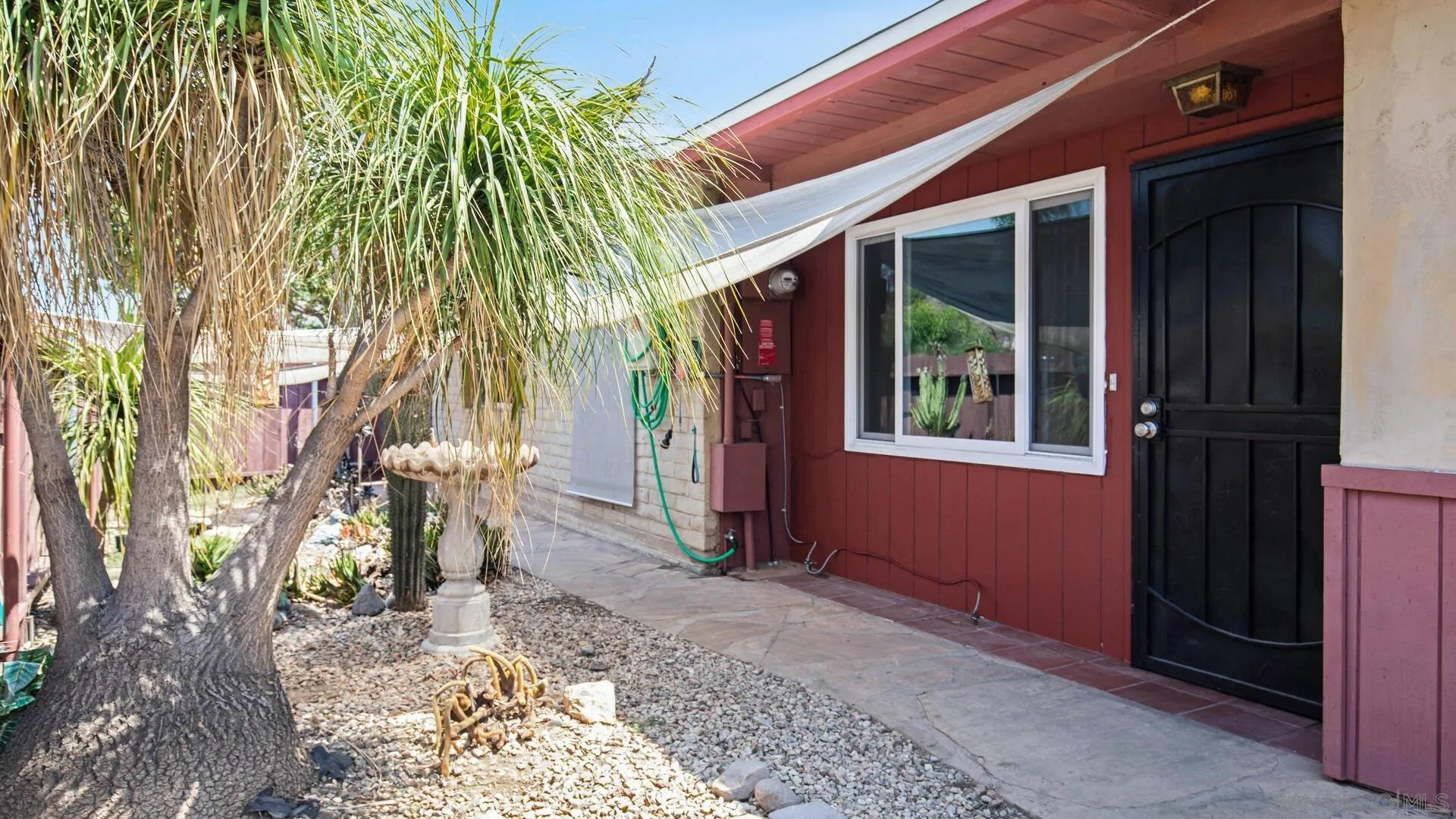 9243 Los Coches Road Lakeside, CA 92040 - Photo 4 of 30 a backyard of a house with seating space