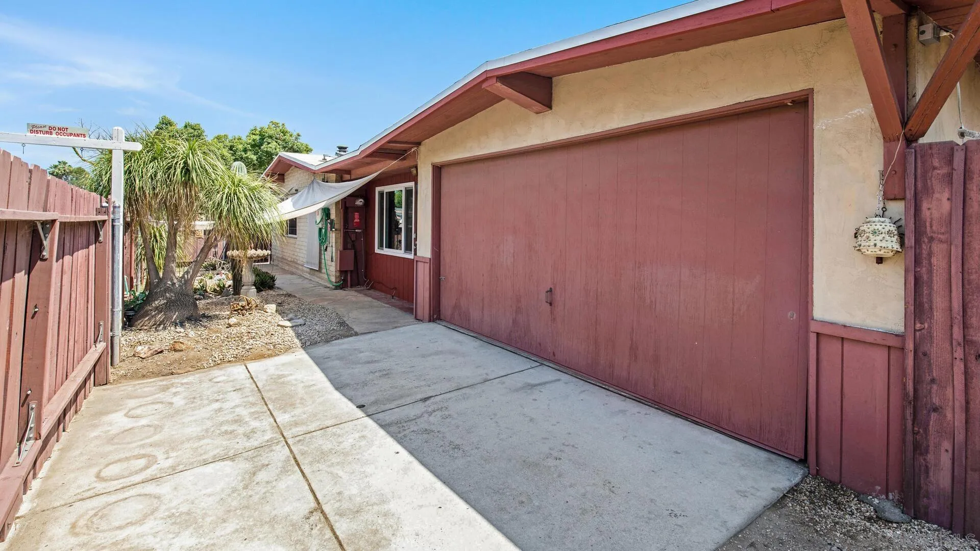 9243 Los Coches Road Lakeside, CA 92040 - Photo 6 of 30 a backyard of a house with seating space