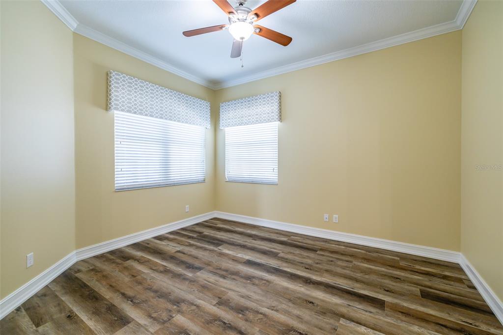 16122 Cedar Key Drive Wimauma, FL 33598 - Photo 12 of 98 a view of room with window and ceiling fan