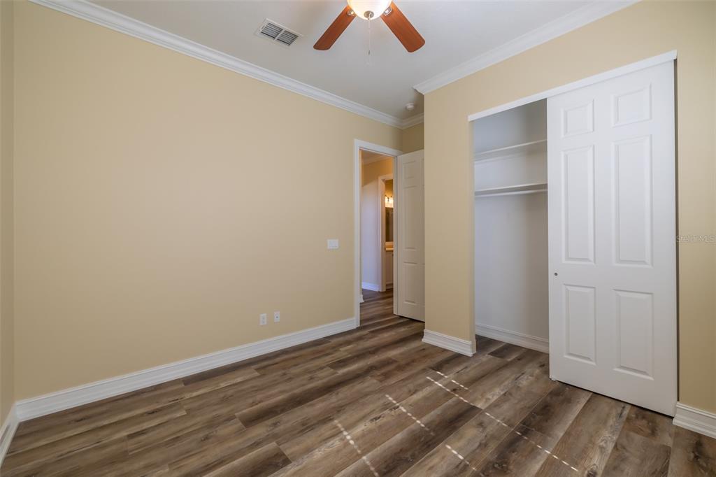 16122 Cedar Key Drive Wimauma, FL 33598 - Photo 19 of 98 a view of an empty room