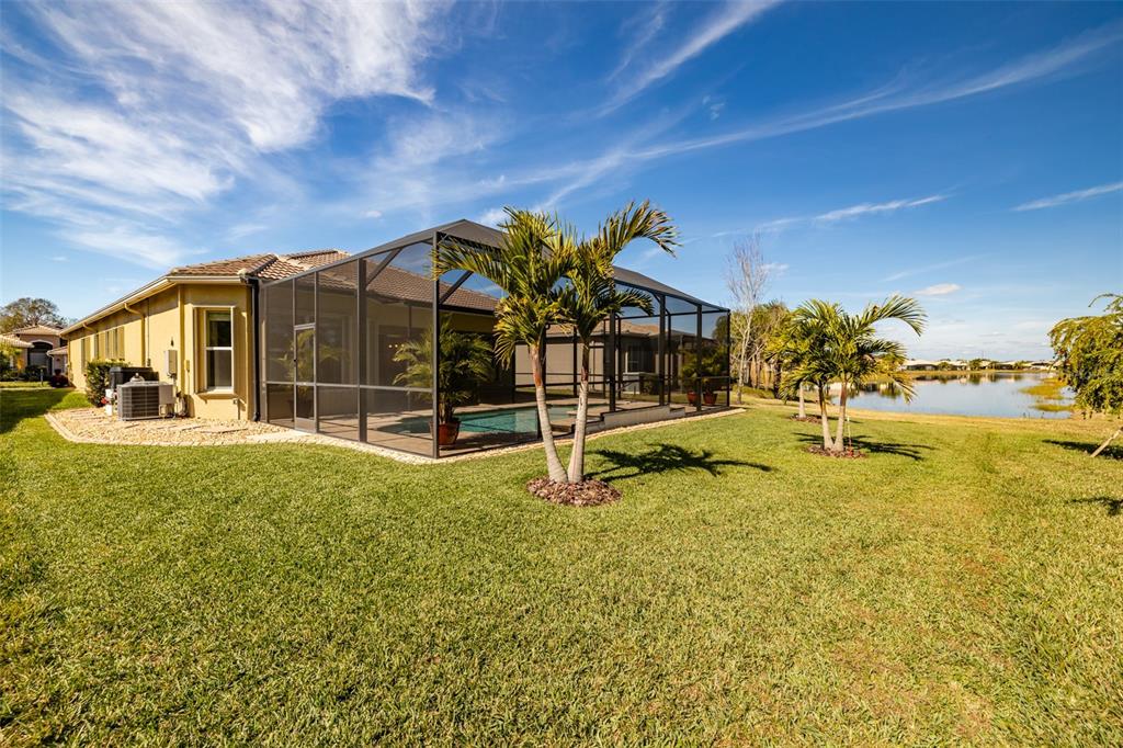 16122 Cedar Key Drive Wimauma, FL 33598 - Photo 43 of 98 a view of a house with swimming pool