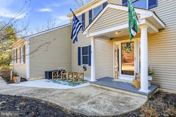 a view of a house with small yard