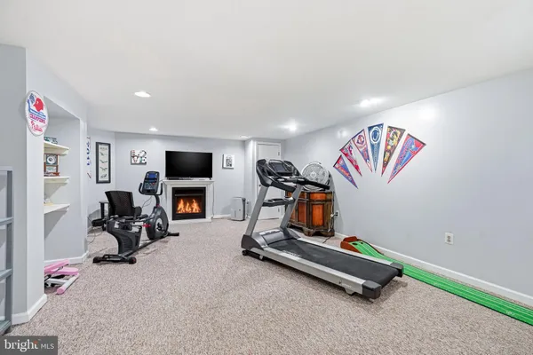 a view of a swimming pool with an outdoor space and seating area