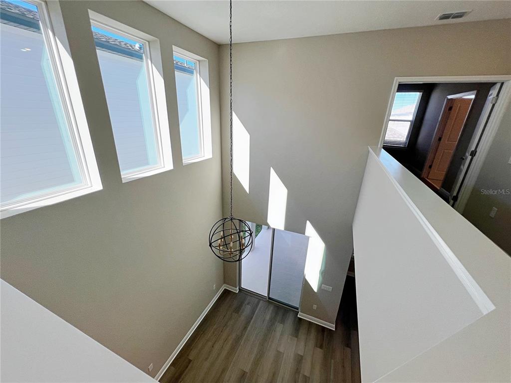 14111 Frasier Street Winter Garden, FL 34787 - Photo 22 of 41 a view of an entryway with wooden floor
