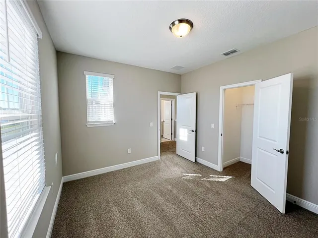 a view of a room with stairs