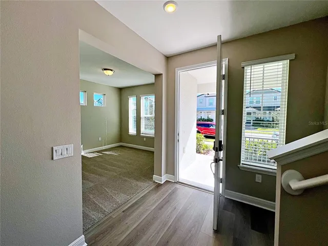 wooden floor and windows in a room