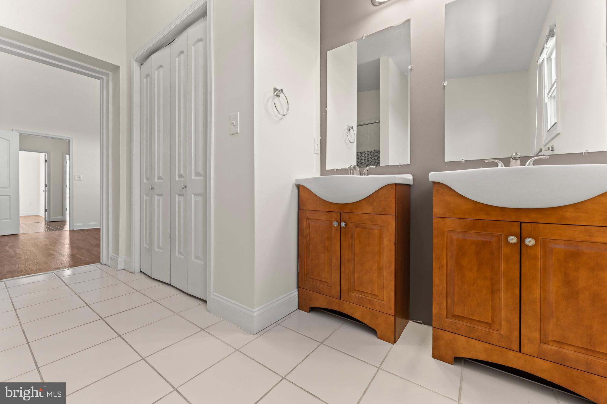 3616 Reisterstown Road Baltimore, MD 21215 - Photo 25 of 34 a view of bathroom with dual sinks