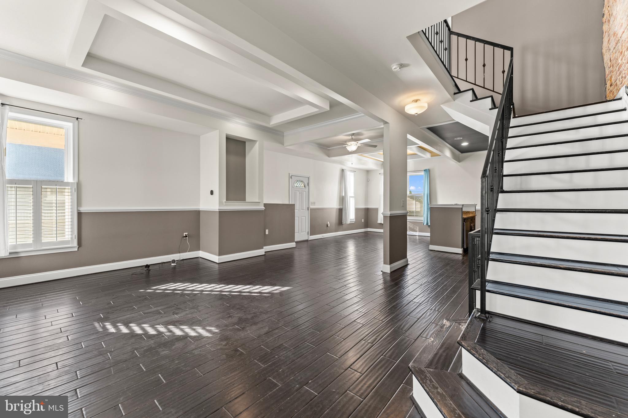 3616 Reisterstown Road Baltimore, MD 21215 - Photo 5 of 34 a view of a hallway view with wooden floor and staircase