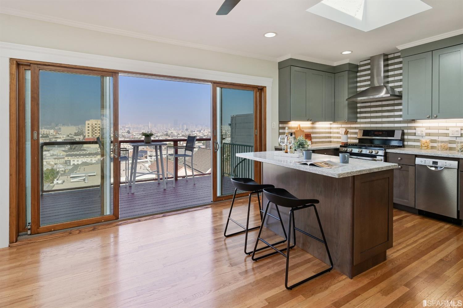 41 Montezuma Street San Francisco, CA 94110 - Photo 13 of 62 a kitchen with stainless steel appliances granite countertop a stove a sink dishwasher and a refrigerator with wooden floor