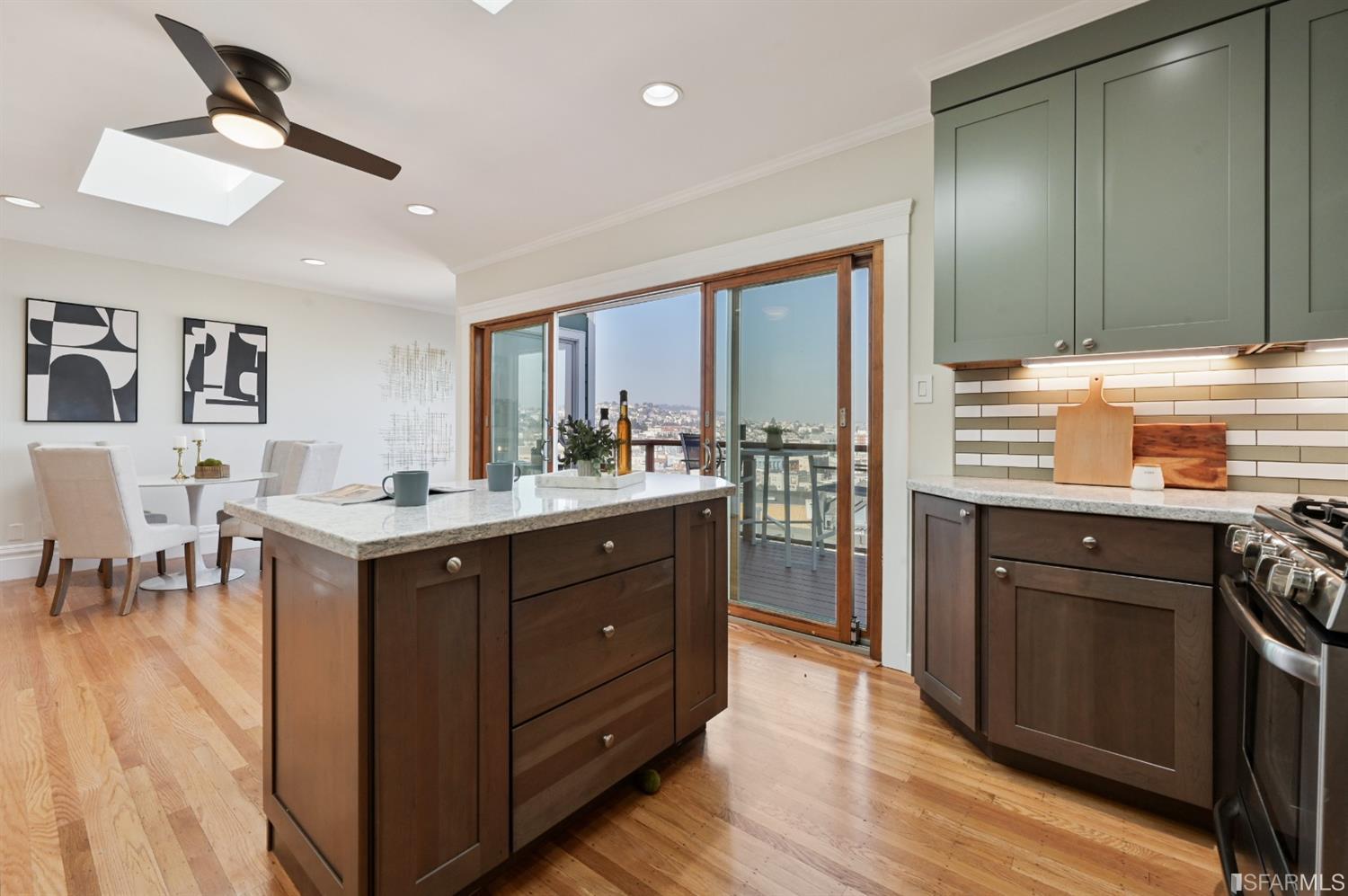 41 Montezuma Street San Francisco, CA 94110 - Photo 17 of 62 a kitchen with a sink cabinets and wooden floor