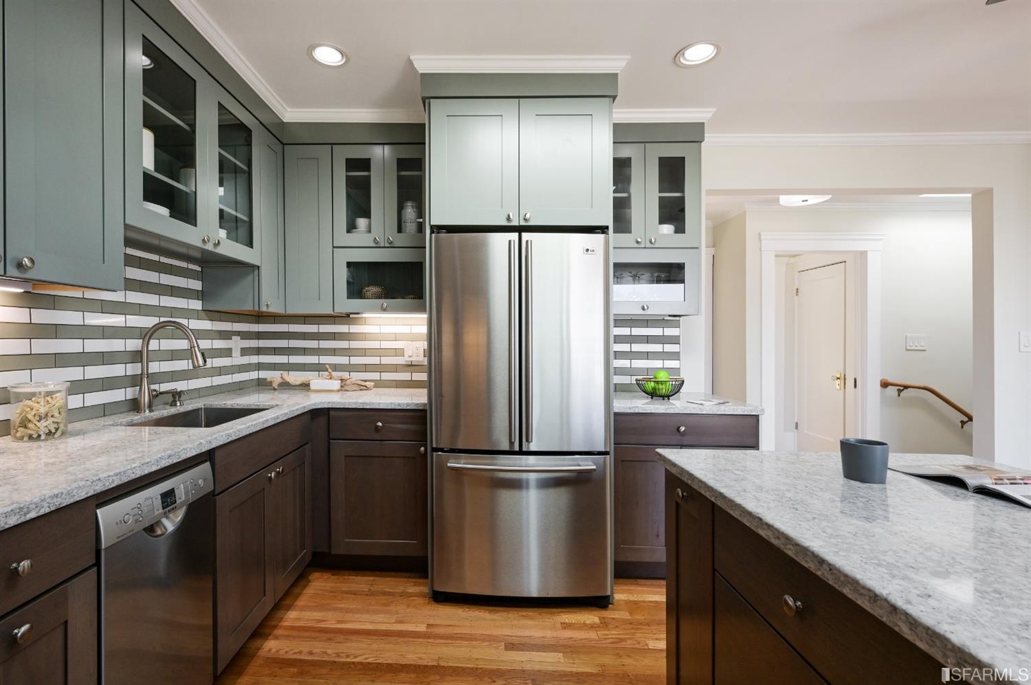 41 Montezuma Street San Francisco, CA 94110 - Photo 18 of 62 a kitchen with kitchen island granite countertop a sink appliances and cabinets