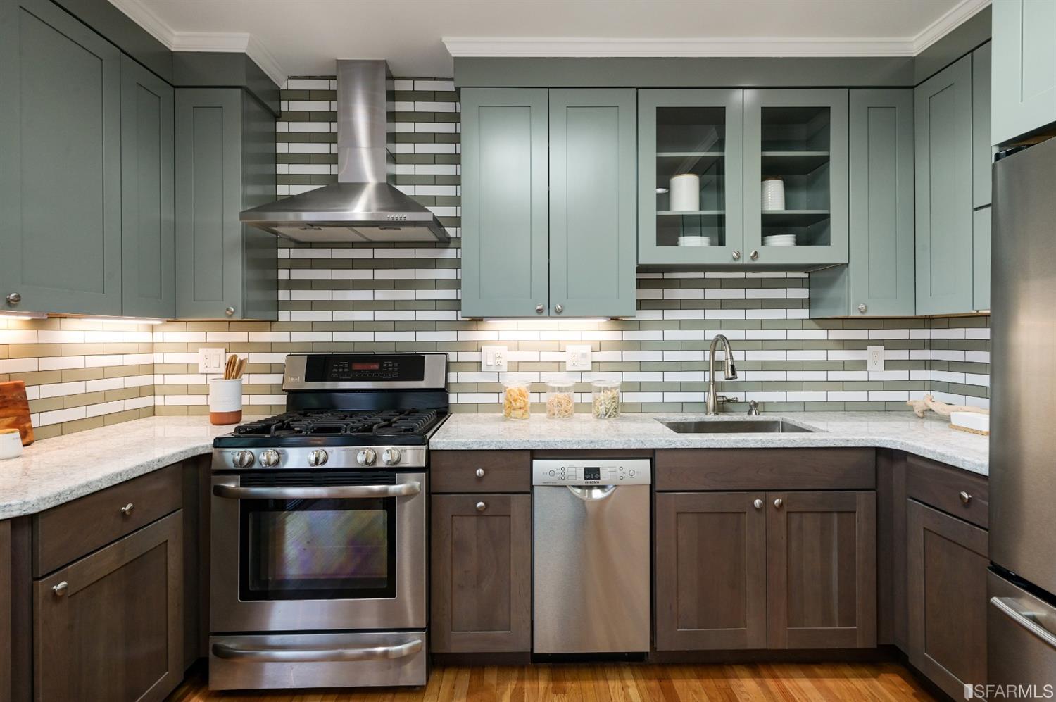 41 Montezuma Street San Francisco, CA 94110 - Photo 20 of 62 a kitchen with granite countertop a stove and a sink