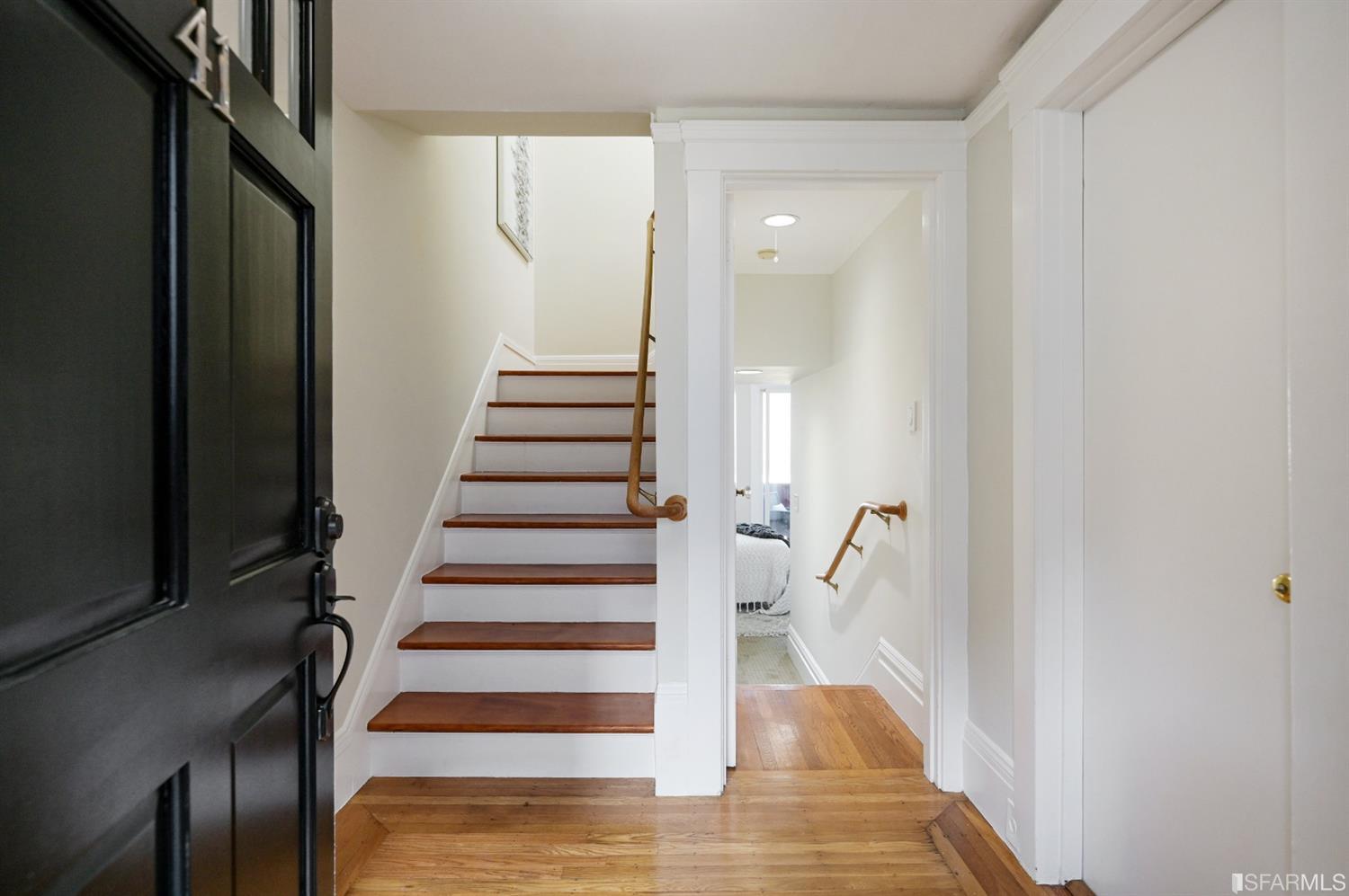 41 Montezuma Street San Francisco, CA 94110 - Photo 2 of 62 a view of entryway and hall with wooden floor