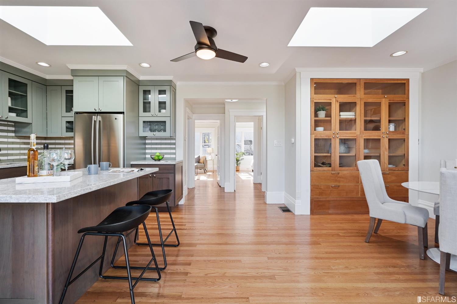 41 Montezuma Street San Francisco, CA 94110 - Photo 22 of 62 a view of a kitchen with furniture and wooden floor