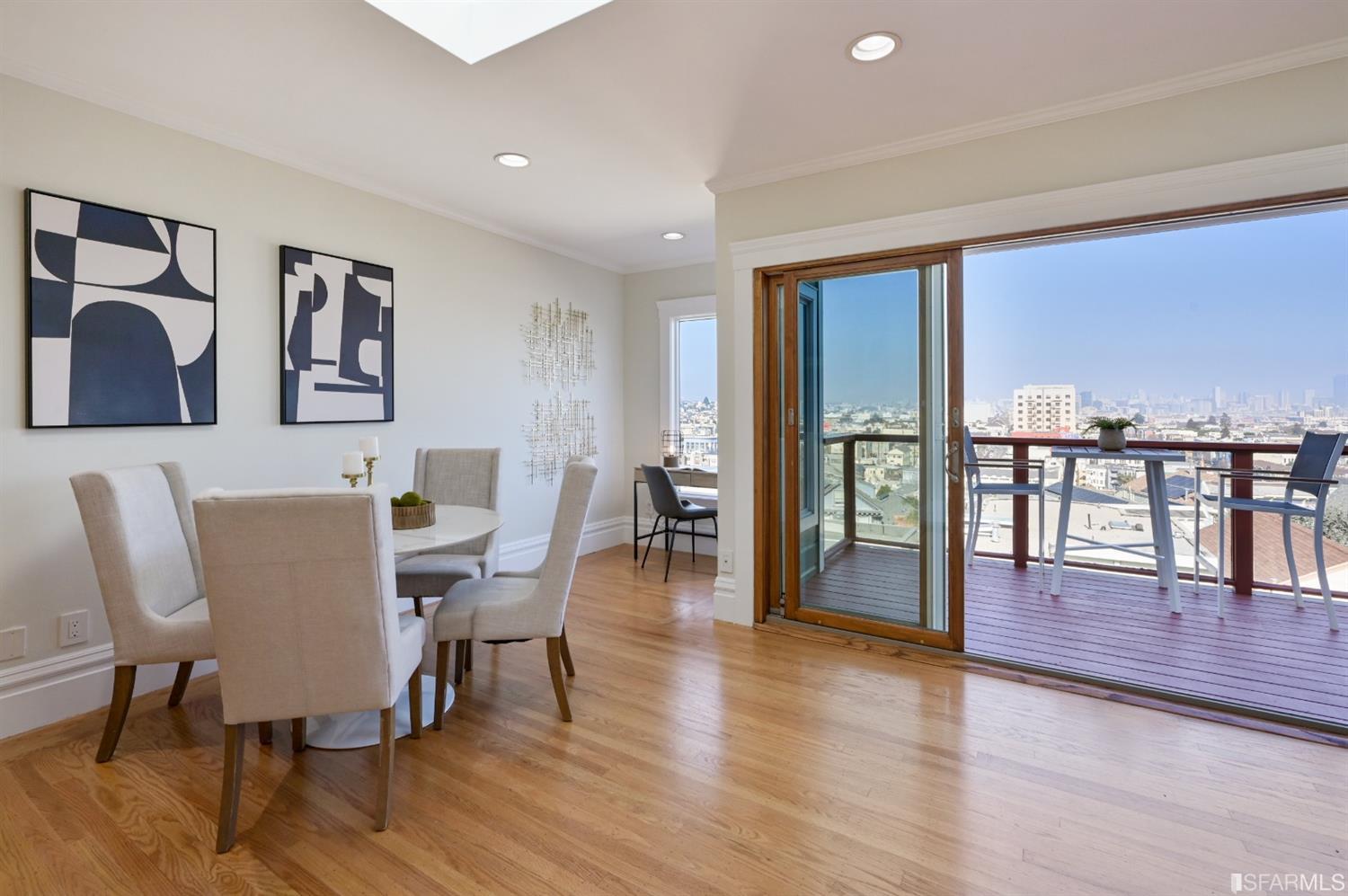 41 Montezuma Street San Francisco, CA 94110 - Photo 23 of 62 a view of a livingroom with furniture and wooden floor
