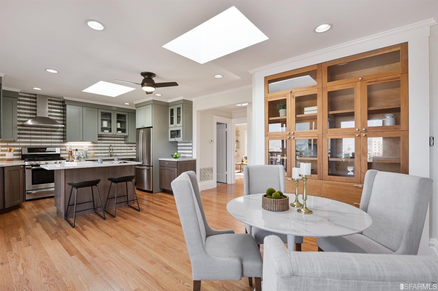 41 Montezuma Street San Francisco, CA 94110 - Photo 24 of 62 a view of a dining room with furniture and wooden floor
