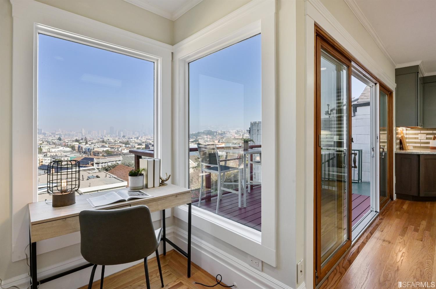 41 Montezuma Street San Francisco, CA 94110 - Photo 26 of 62 a view of a dining room with furniture window and wooden floor